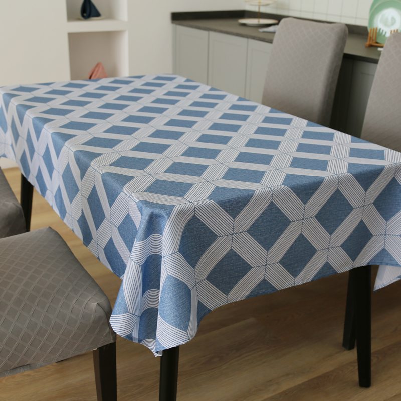 White Geometric Print Tablecloth On Blue Background